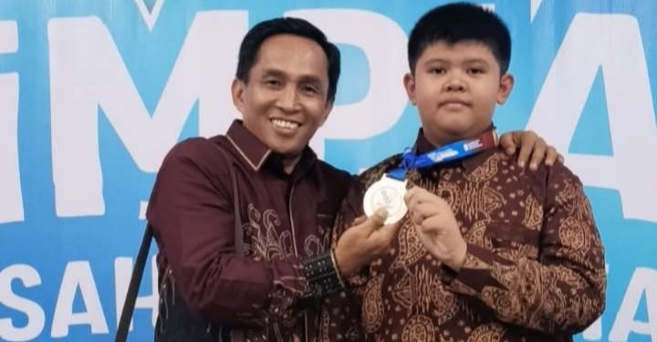 Siswa MTsN 1 kota Sungai Penuh raih Medali Perak di OMI 2025